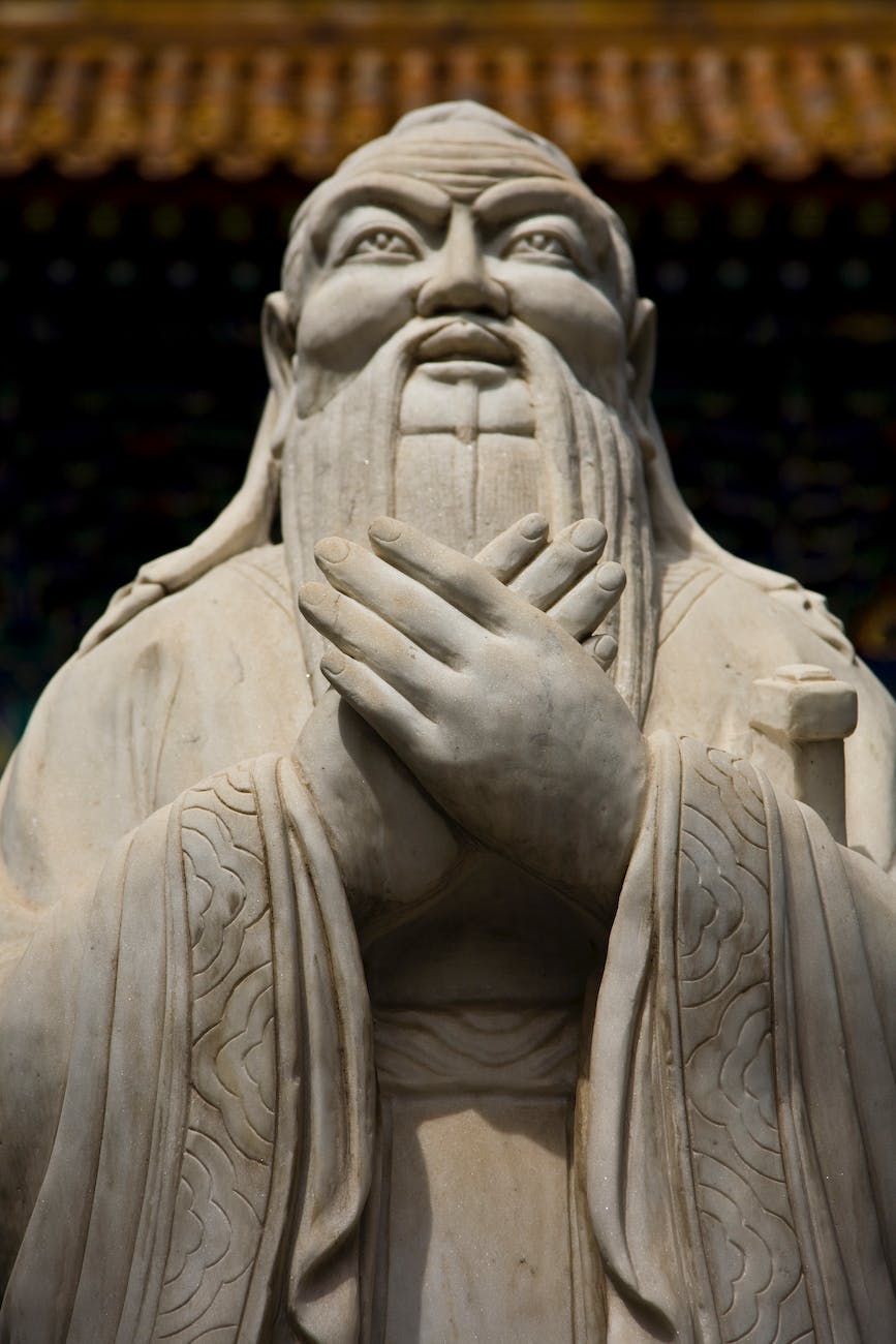 concrete statue of confucius